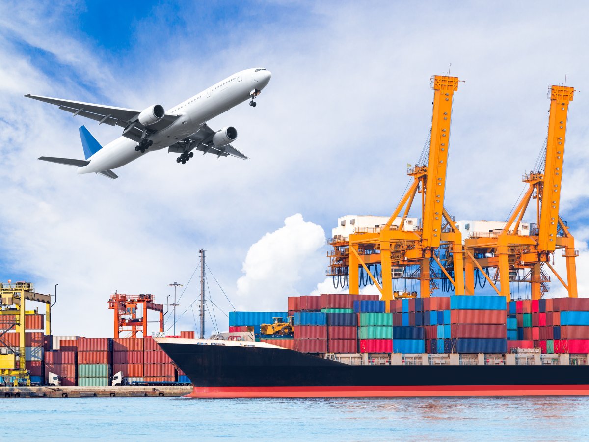 Airplane flying over container ship and port — international shipping from USA to Europe